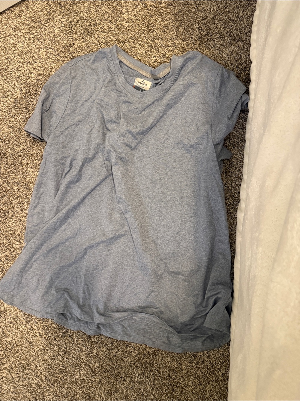 Women’s light blue tee shirt